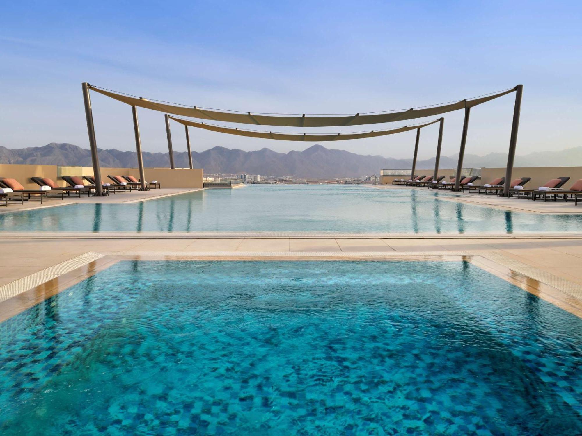 Moevenpick Hotel & Apartments Ghala Маскат Экстерьер фото The pool at the hotel
