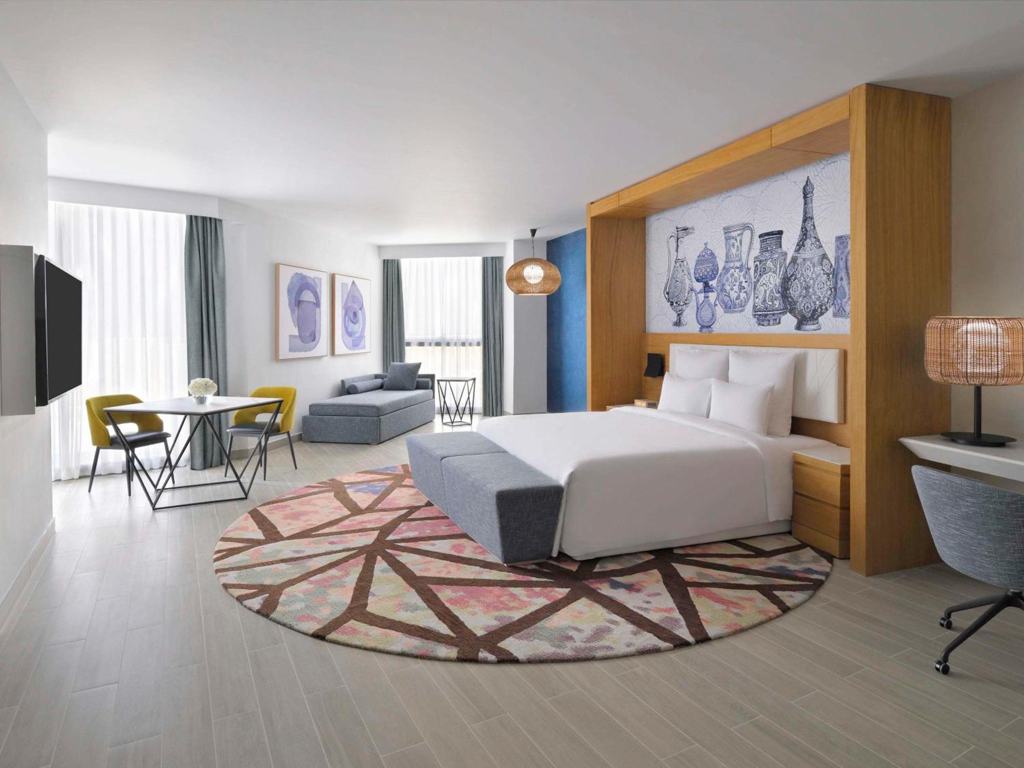Moevenpick Hotel & Apartments Ghala Маскат Экстерьер фото A room at the hotel